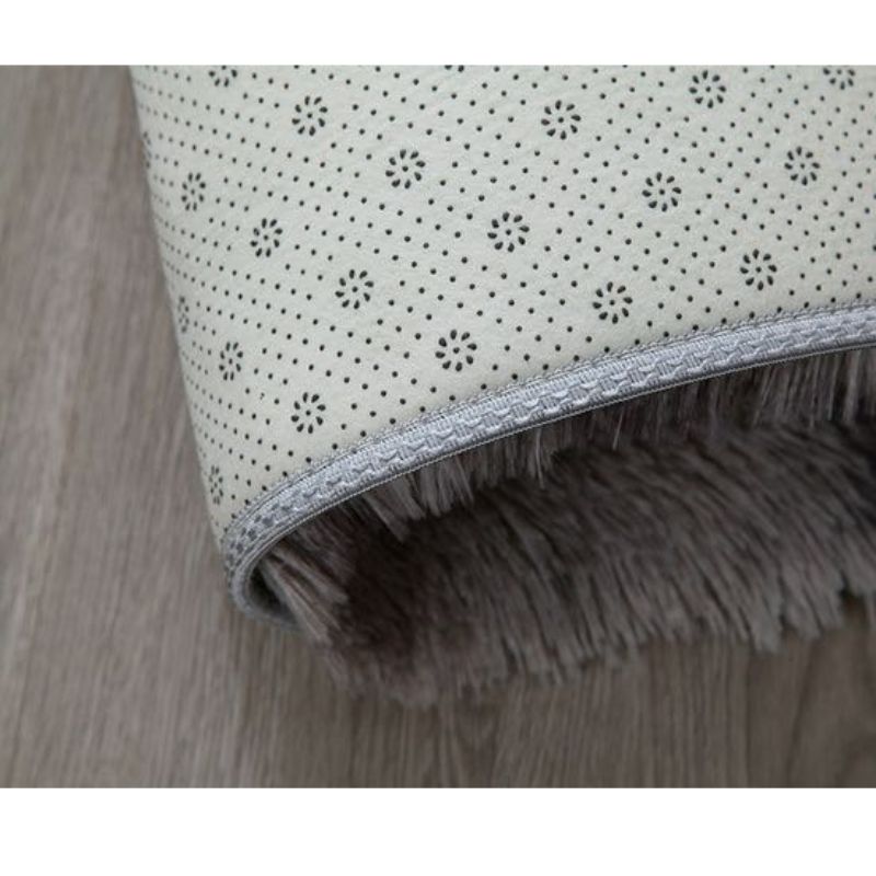 Detail van wasbaar vloerkleed met antislip onderzijde voor extra grip op de vloer